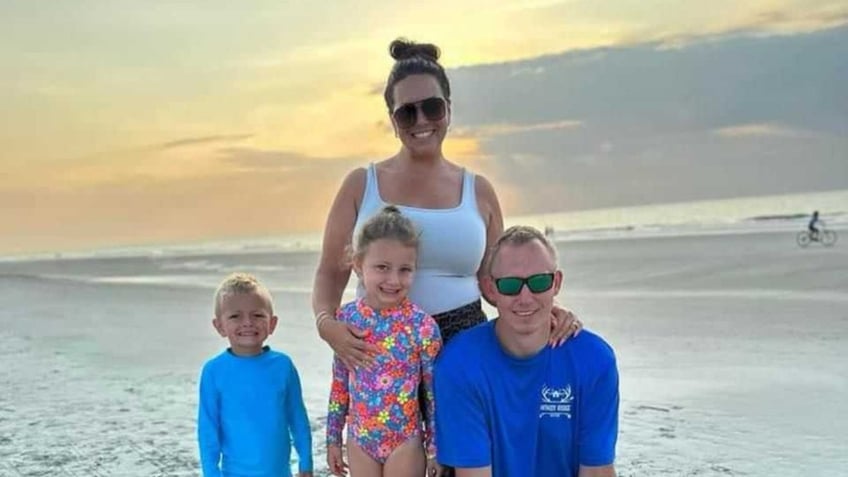 Bryan Hagerich and his family on the beach