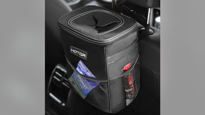 Keep trash off the car floor with a car trash can. 