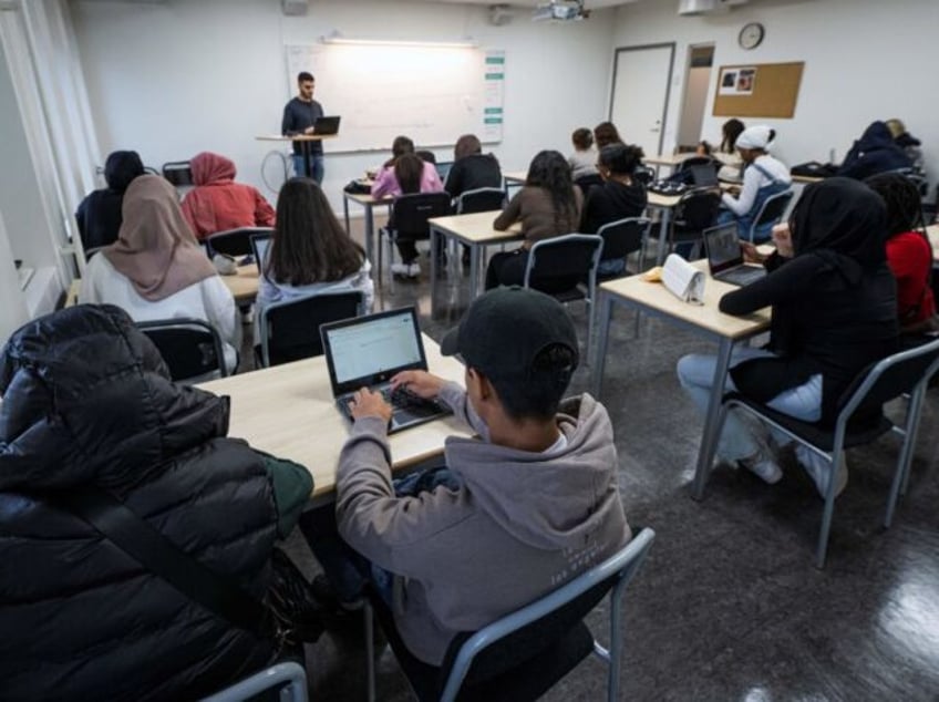 turning from hyper digitalised education sweden returns to handwriting printed books at school