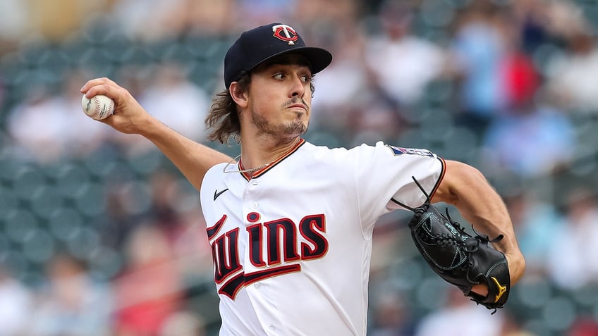 Joe Ryan pitches during a baseball game