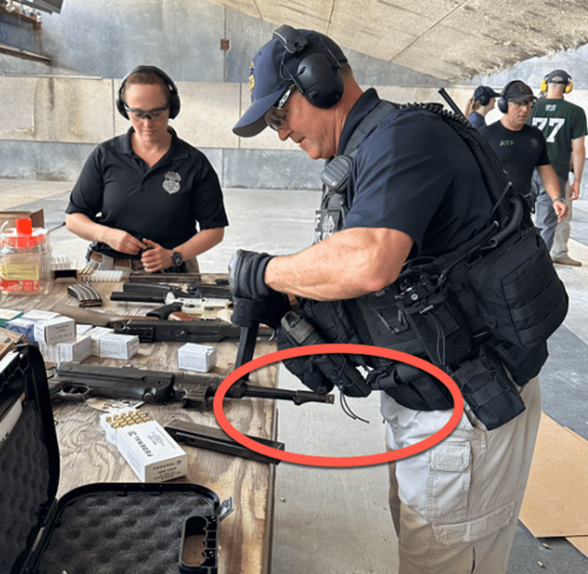 twitter roasts atf for posting image of agent loading nazi gun pointed at testicles 