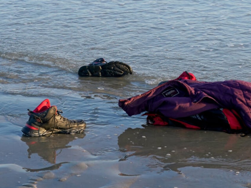 Debris left by people thought to be migrants after boarding a small boat off the beach in