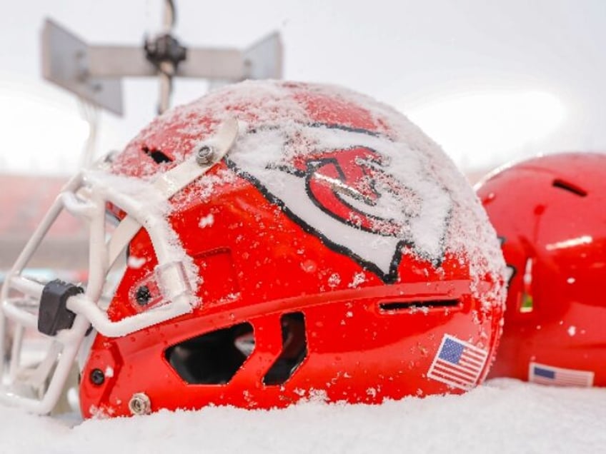 KANSAS CITY, MO - DECEMBER 15: Snow covers the helmets of Kansas City Chiefs players durin