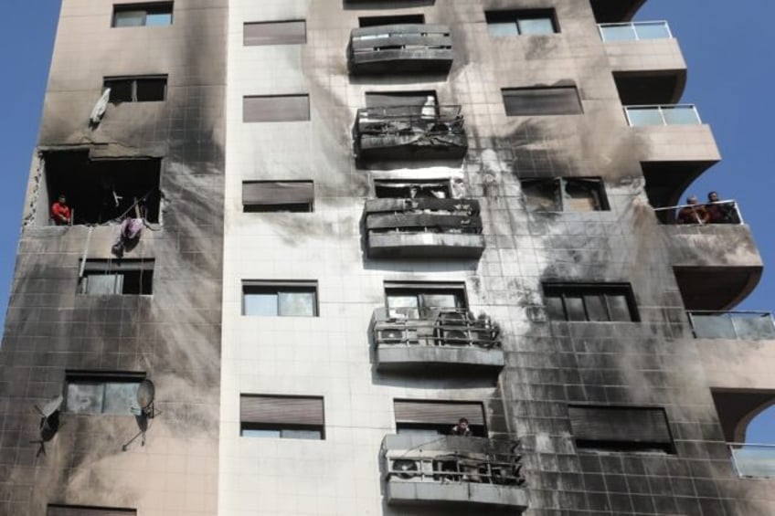 The strike hit a nine-storey building whose outside has been partially blackened, with dam