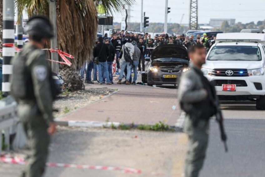 Israeli security forces secure the scene of a deadly shooting in the southern town of Kiry