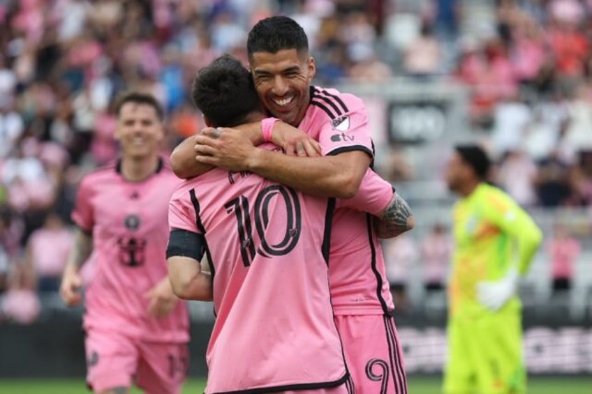 Luis Suarez celebrates with Lionel Messi after scoring in Inter Miami's 5-0 win over Orlan