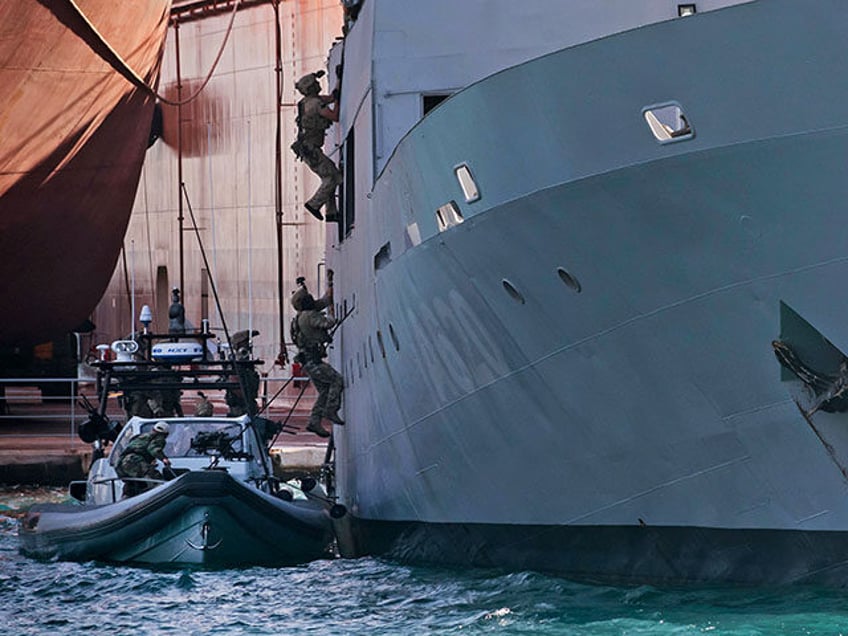 Cypriot Navy special forces and US Navy SEALS take part in a joint US-Cyprus rescue exercise in the port of the southern Cypriot port city of Limassol on September 10, 2021. (Photo by Iakovos Hatzistavrou / AFP) (Photo by IAKOVOS HATZISTAVROU/AFP via Getty Images)