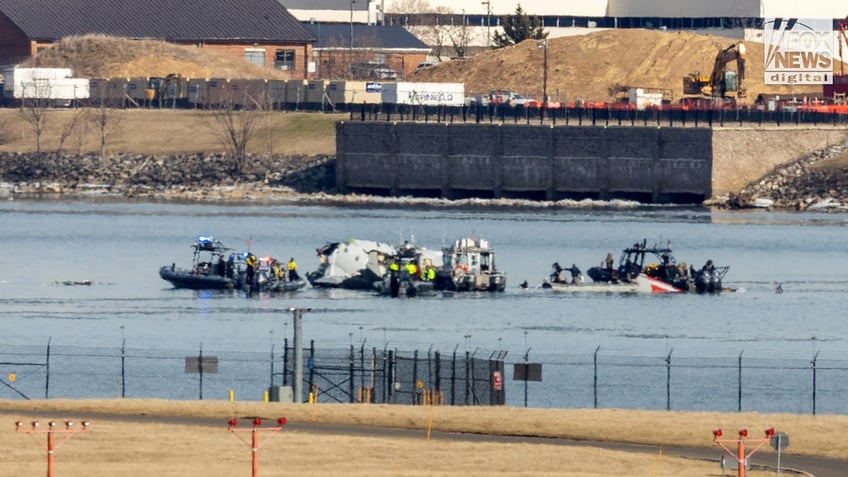 Search efforts in DC after a collision between an American Airlines jet and a U.S. Black Hawk helicopter