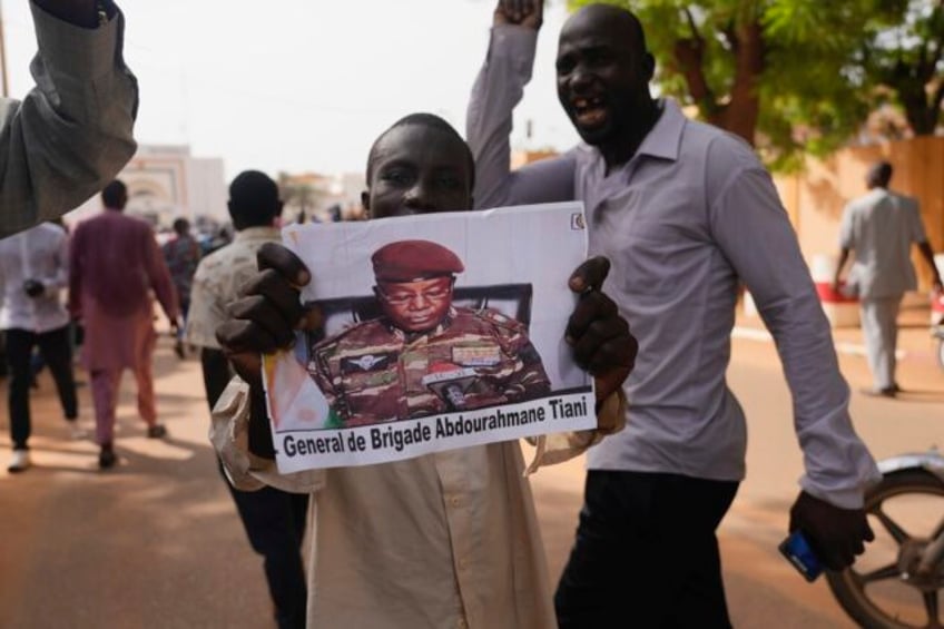 two rivals claim to be in charge in niger one is detained and has been publicly silent for days