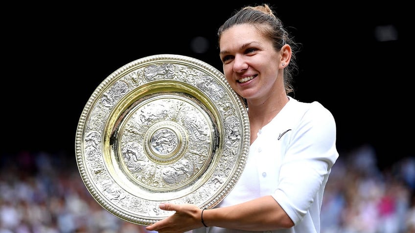 two time grand slam champion simona halep hit with 4 year ban over anti doping violations