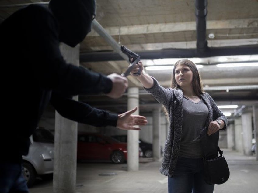 two weeks during which women used guns for self defense 13 times