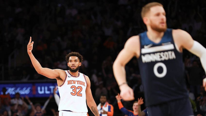 Karl-Anthony Towns celebrates