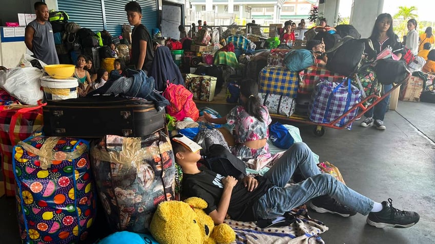 typhoon doksuri approaches northern philippines thousands evacuate sea travel disrupted