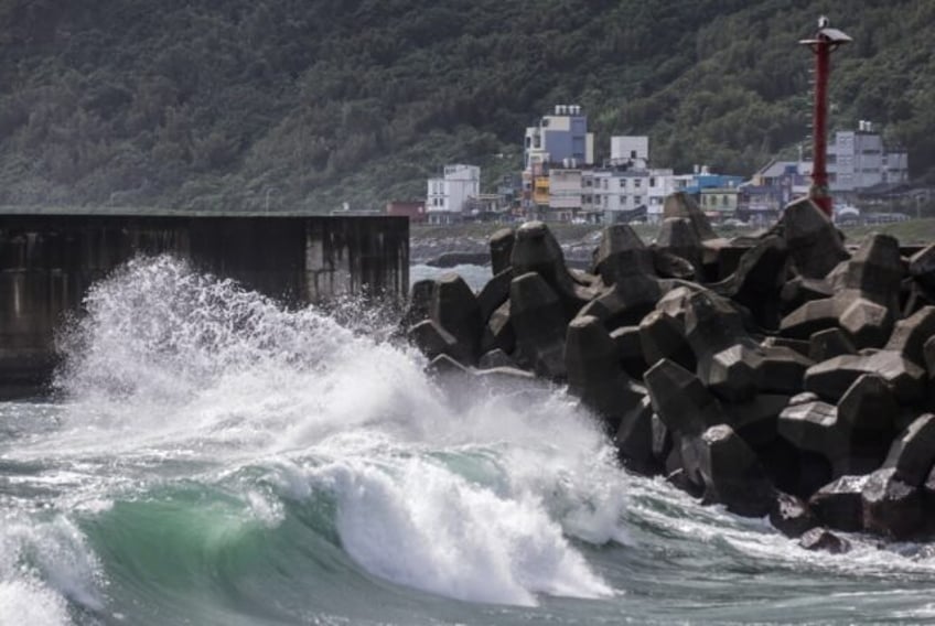 typhoon koinu brings record winds torrential rains to taiwan