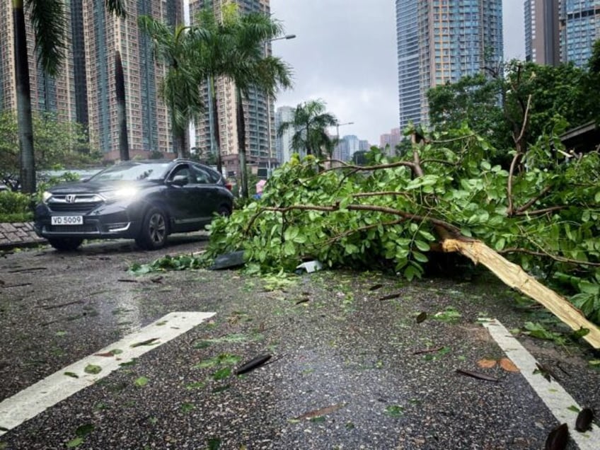 typhoon saola weakens but still a threat in southern china