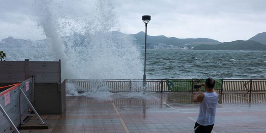 typhoon talim sweeps south of hong kong prompting schools stock market to close