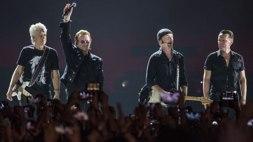 U2 on stage in India