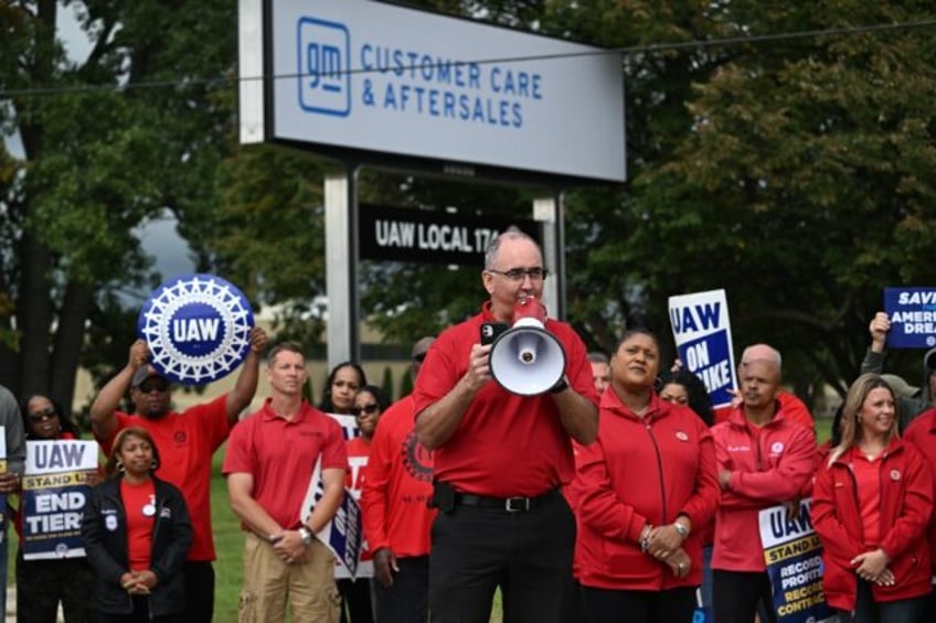 uaw reports progress in negotiations with big three automakers holds off on strike expansion