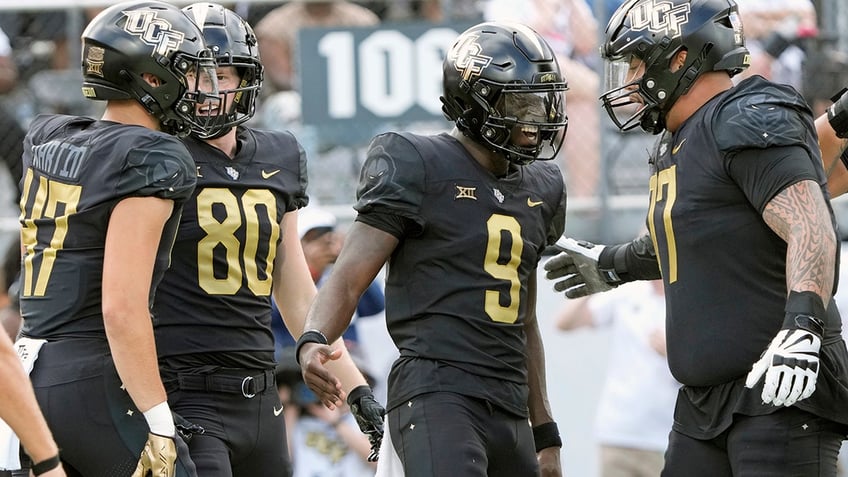 ucfs timmy mcclain avoids multiple tackles in gritty play to keep drive alive baylor gets last laugh