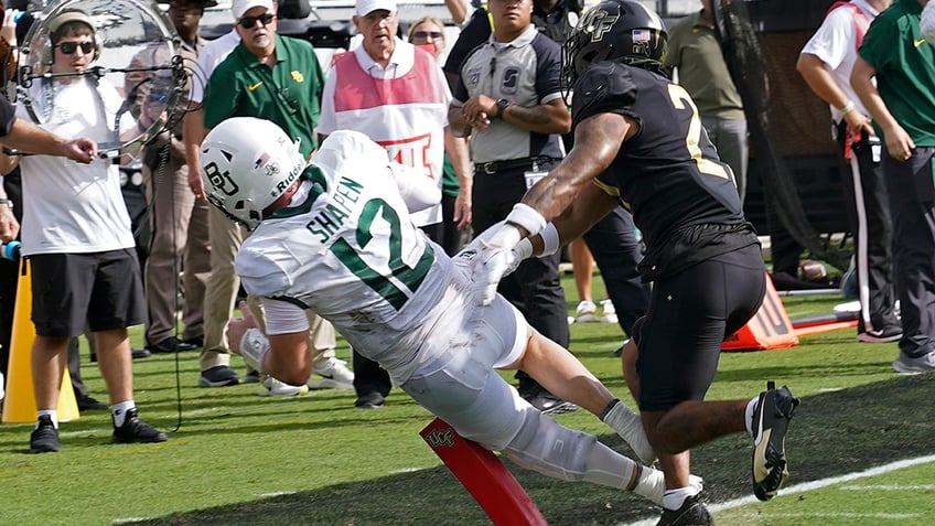 ucfs timmy mcclain avoids multiple tackles in gritty play to keep drive alive baylor gets last laugh