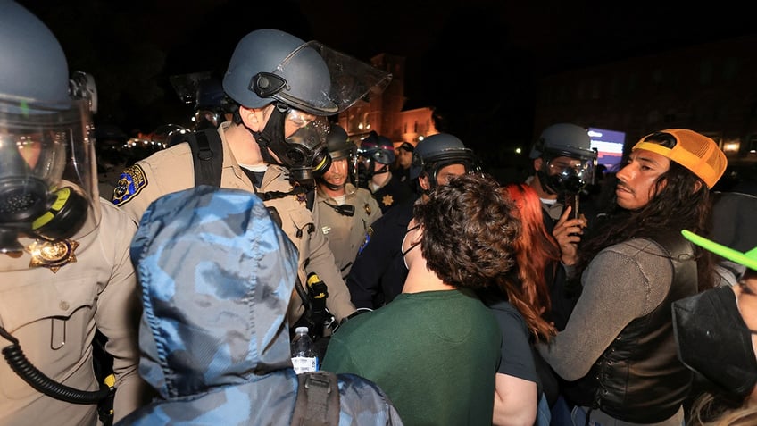 Protesters pressing police