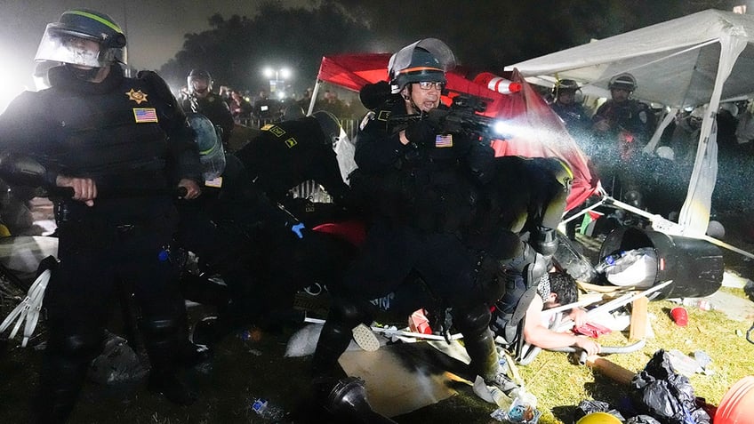 Police officers at UCLA anti-Israel encampment