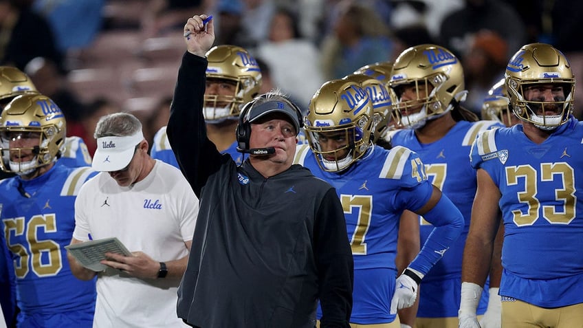 Chip Kelly of the UCLA Bruins reacts during a game