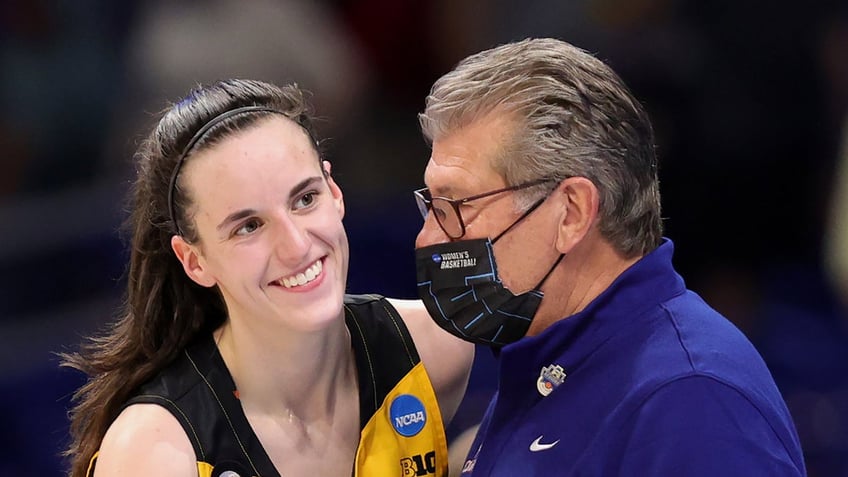 Geno Auriemma and Caitlin clark 