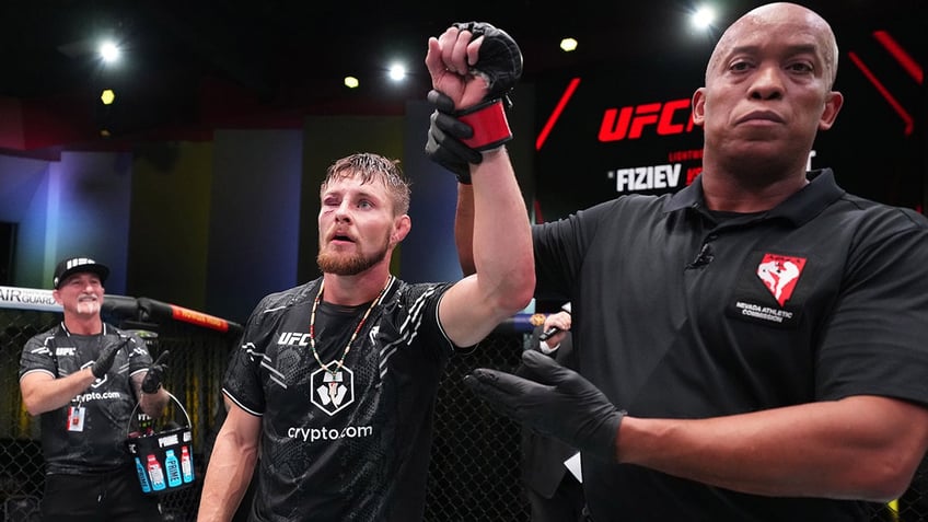 ufc fighter wins bout after bringing bible into cage says company gives me freedom to be who i want to be