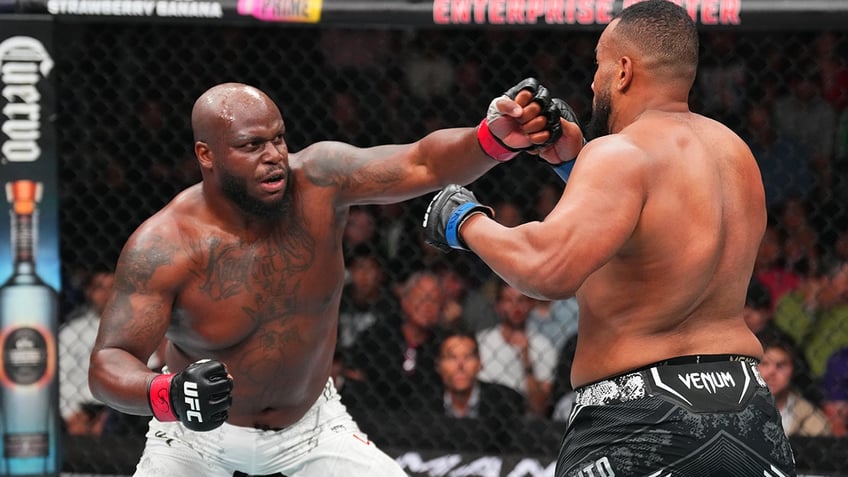 Derrick Lewis throws a punch