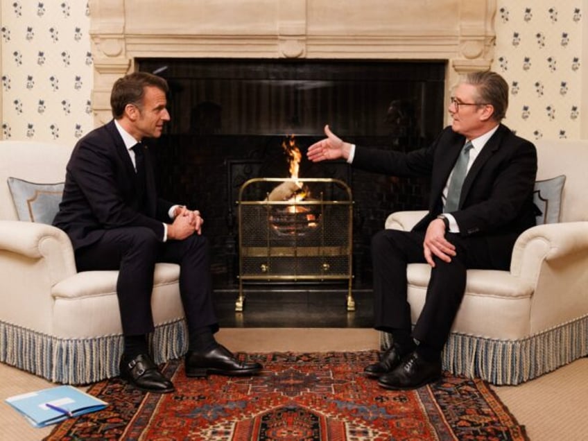 09/01/2025. London, United Kingdom. Prime Minister Keir Starmer chats with French Presiden