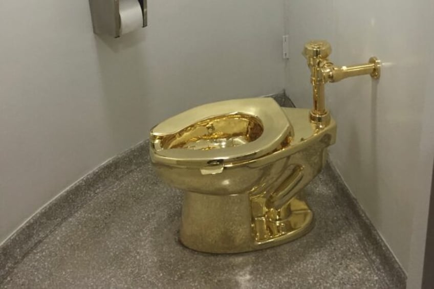 This toilet may be made of solid gold, but it cannot scan "anal-prints" like the one that