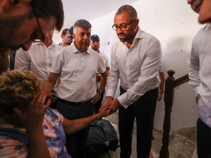 uk foreign minister rushed to bomb shelter during israel visit as rocket attack warnings sound