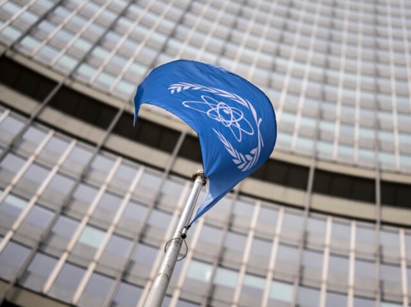 CORRECTS DATE - A flag waves in front of the International Atomic Energy Agency (IAEA) in
