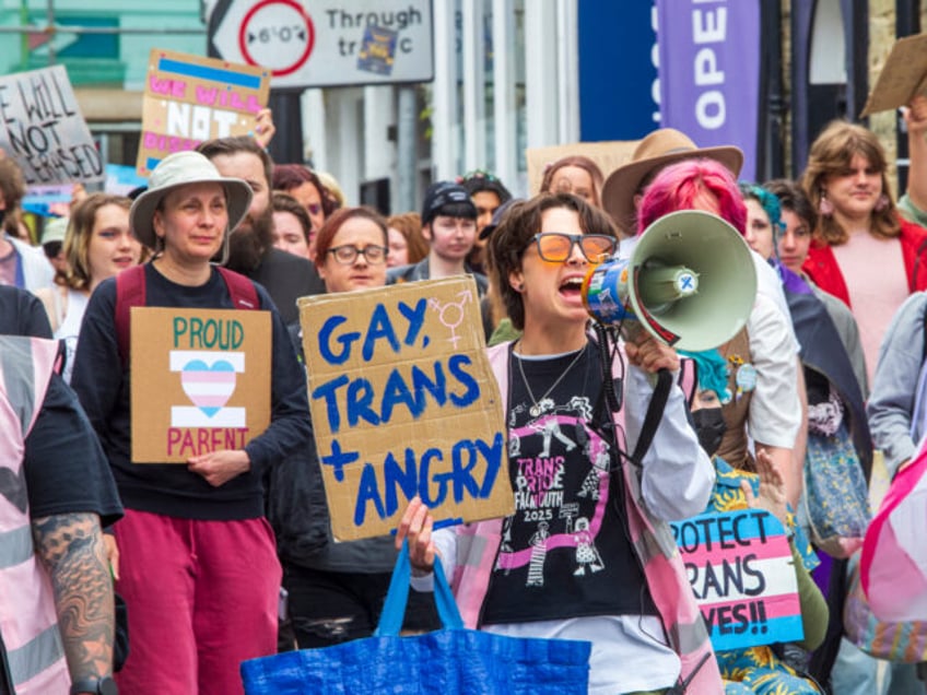 FALMOUTH, ENGLAND - MAY 17: Transgender activists and allies march through the streets of