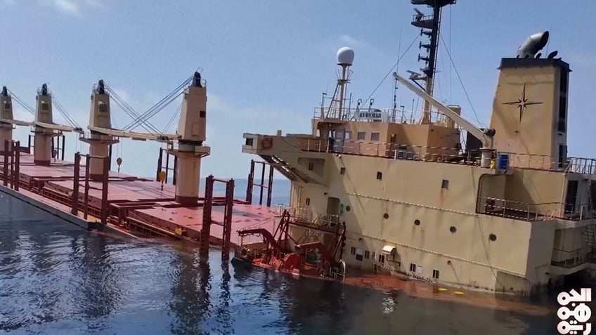 Up close view of a cargo ship in the ocean that was struck by Iran-backed Houthi rebels is sinking