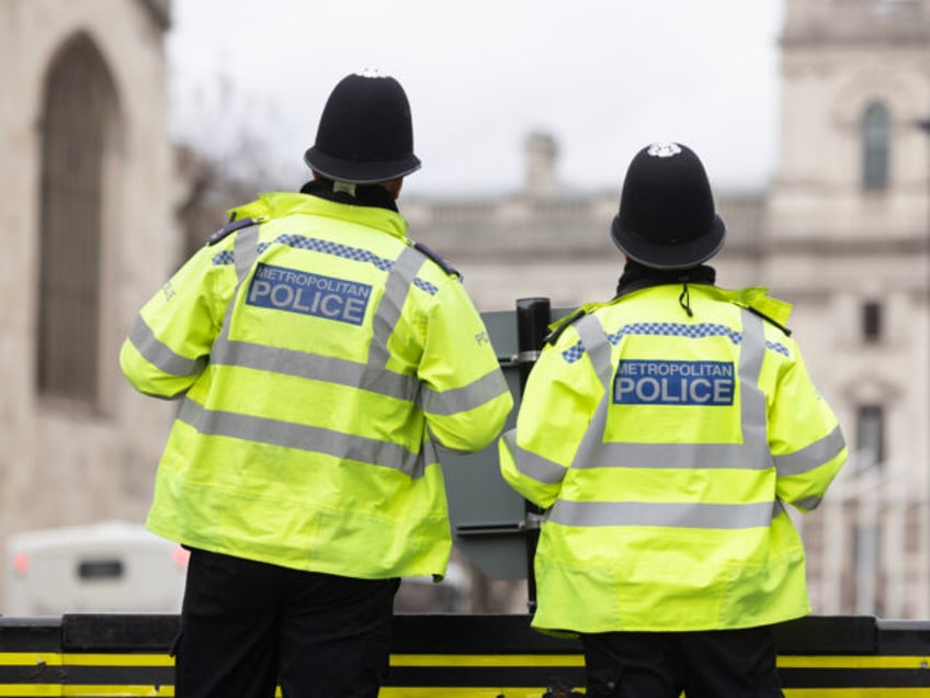 LONDON, ENGLAND - MARCH 21: Metropolitan Police officers outside the Houses of Parliament