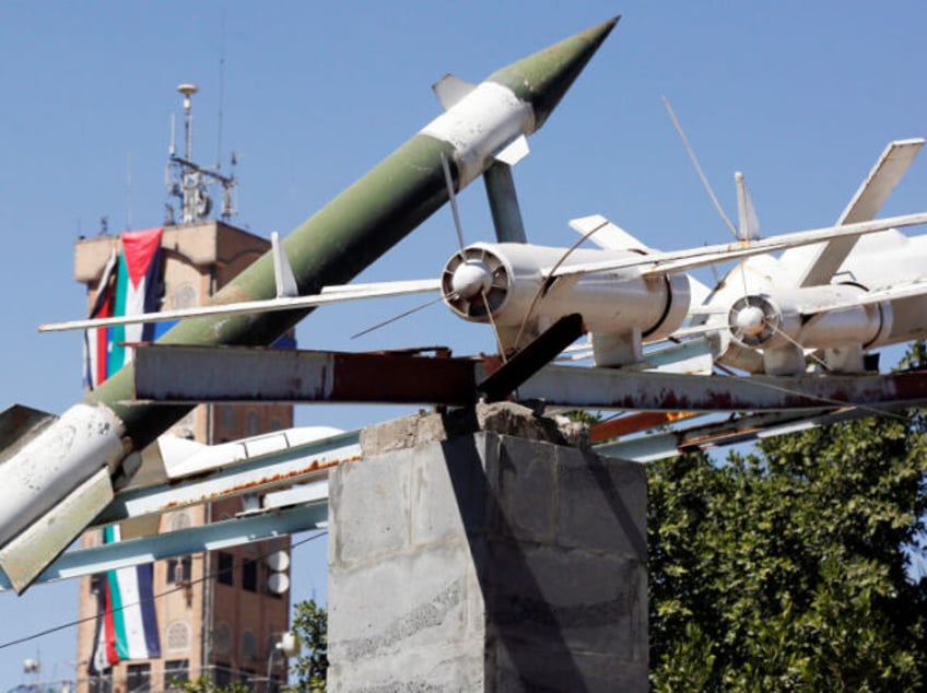 SANA'A, YEMEN - DECEMBER 07: Mock drones and missiles are displayed at a square on December 07, 2023 in Sana'a, Yemen. (Photo by Mohammed Hamoud/Getty Images)