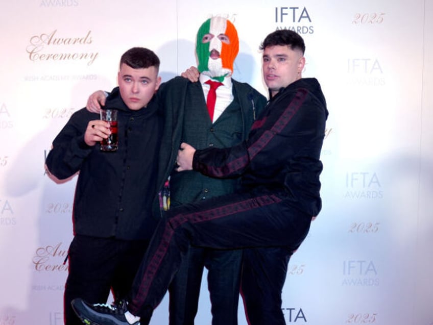 (left to right) members of Kneecap, Mo Chara, JJ O'Dochartaigh and Moglai Bap attendi
