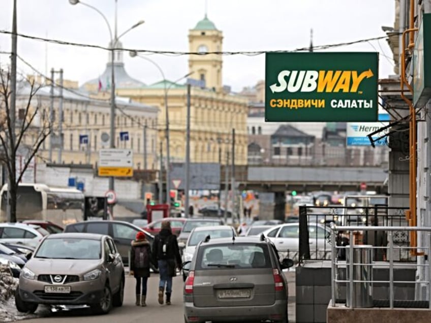 A logo sits on display outside a Subway fast food restaurant in Moscow, Russia, on Sunday, April 7, 2013. McDonald's, which virtually created the market for burgers and fries in the country and convinced Russians it's OK to eat with their hands, must fend off a growing challenge from rivals …