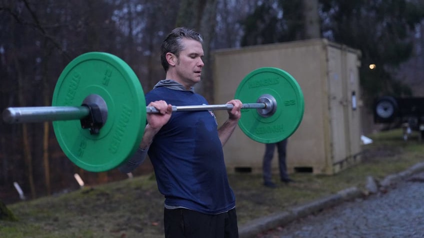 Defense Secretary Pete Hegseth participates in PT with the 1st Battalion, 10th Special Forces Group (Airborne), a US Army Special Forces battalion based in Stuttgart, Germany