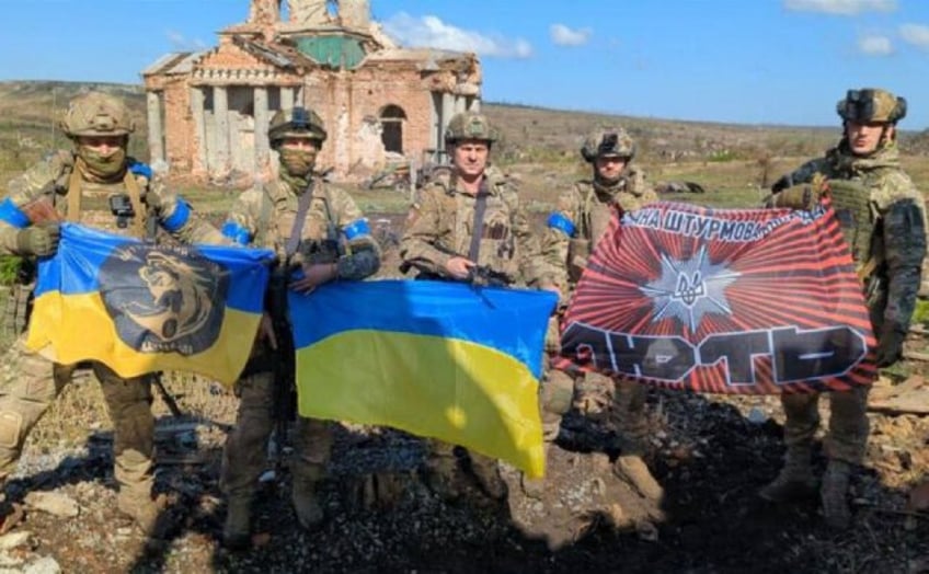 ukraine claims control of key town on eastern front