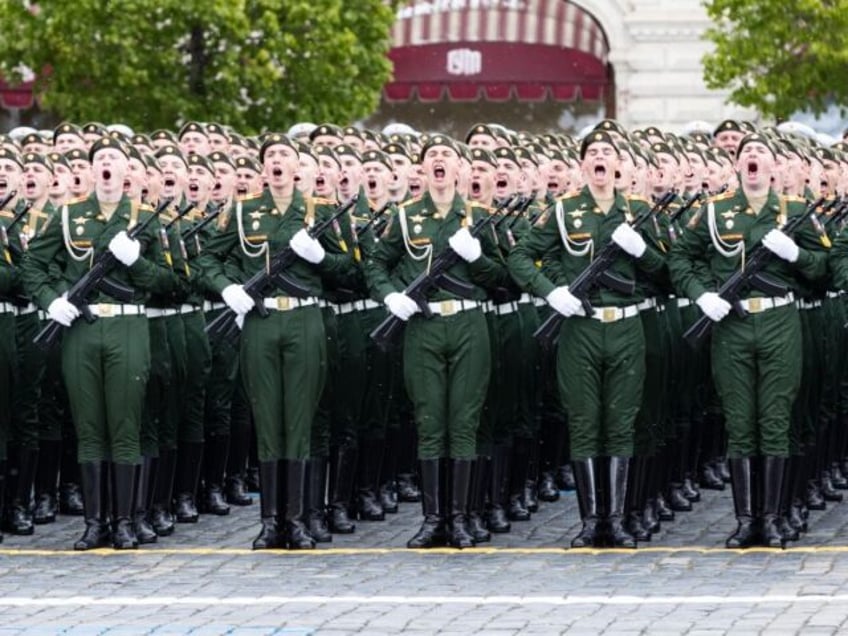 Servicemen take part in the Victory Day military parade, which marks the 79th anniversary