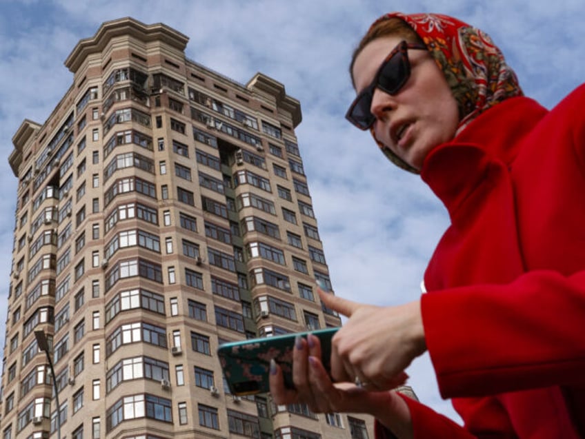 A view shows a damaged apartment building following a drone attack in the town of Ramensko