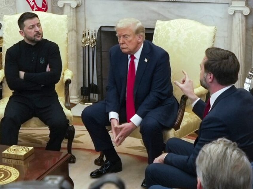 Vice President JD Vance, right, speaks with Ukrainian President Volodymyr Zelenskyy, left,