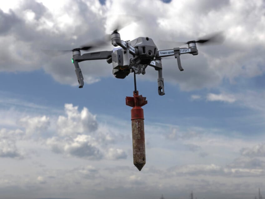 LVIV REGION, UKRAINE - MAY 12: Ukrainian military learn to fly drones with bombs attached at a special school on May 12, 2023 in Lviv region Ukraine. The school is funded by KOLO, a Ukranian foundation running a pilot school of drones and UAV's for the military. Drones are essential …