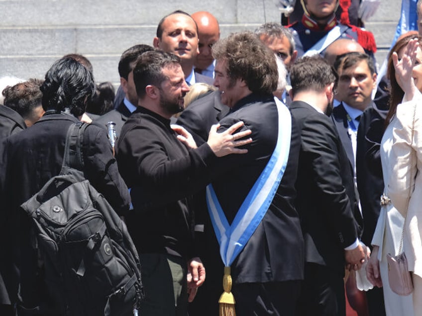 Javier Milei, Argentina's president, center right, greets Volodymyr Zelenskiy, Ukraine's p