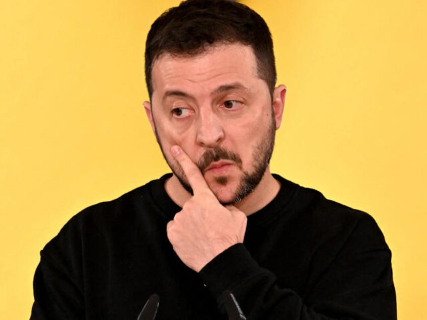 President of Ukraine Volodymyr Zelensky rubs his face during a joint press conference with President of the European Council Charles Michel (not pictured) and President of Moldova Maia Sandu (not pictured) following their talks in Kyiv on November 23, 2023, amid the Russian inavasion of Ukraine. Michel said ahead of …