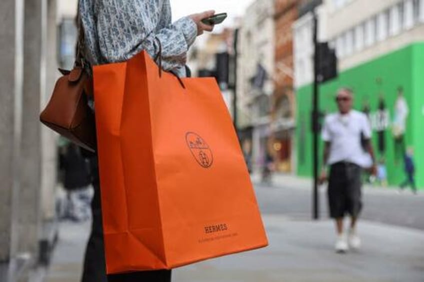 ultra wealthy make it rain on luxury brands as main street tightens belt