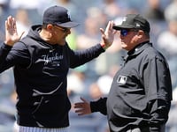 Umpire erroneously ejects Yankees' Aaron Boone after fan yells from stands